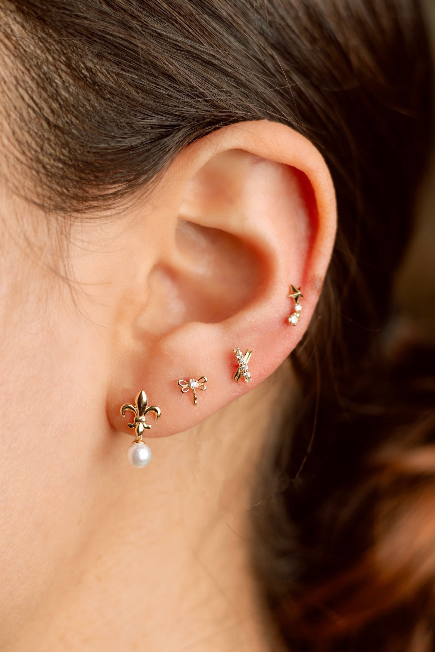 Perla Flor de lis oro 10k par