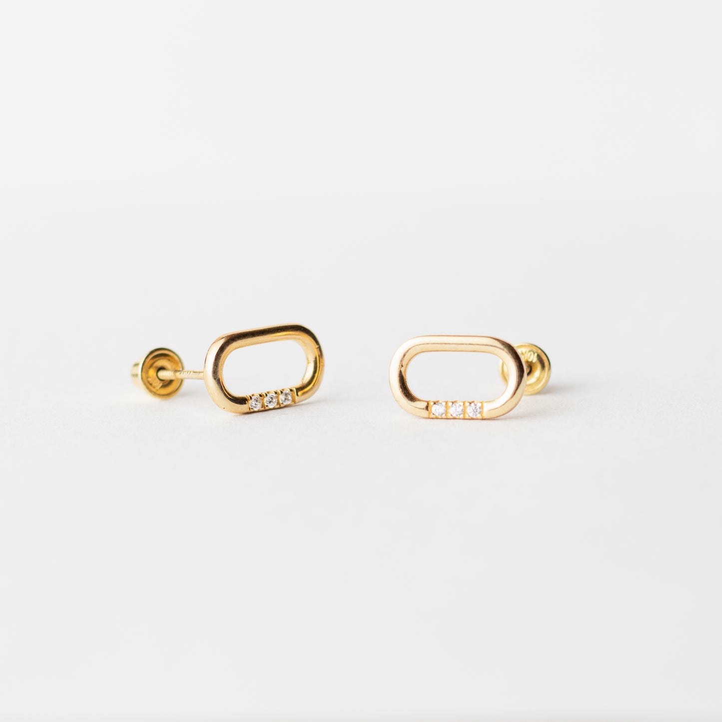 Ovalo con piedra oro 10k par