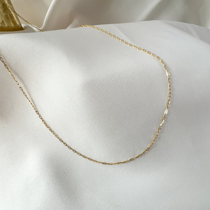 Gargantilla oro 10 kilates dije de flor trébol con piedra negra