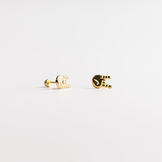 Broquel Mano Rock oro 10k