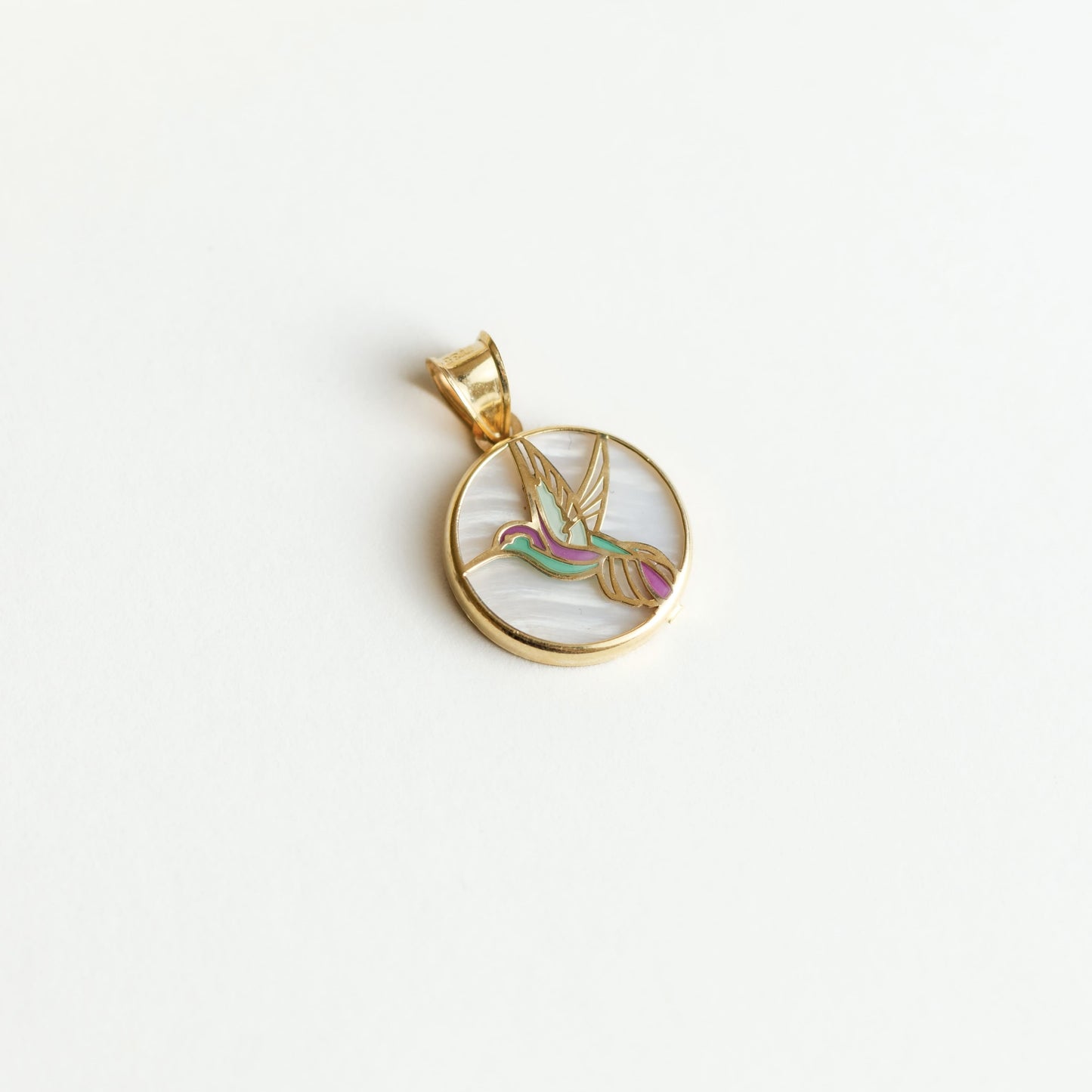 Cadena de oro con dije colibri