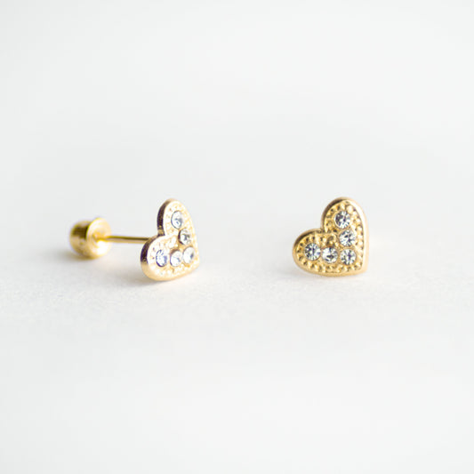 Broquel Corazón con Piedras oro 10k pza