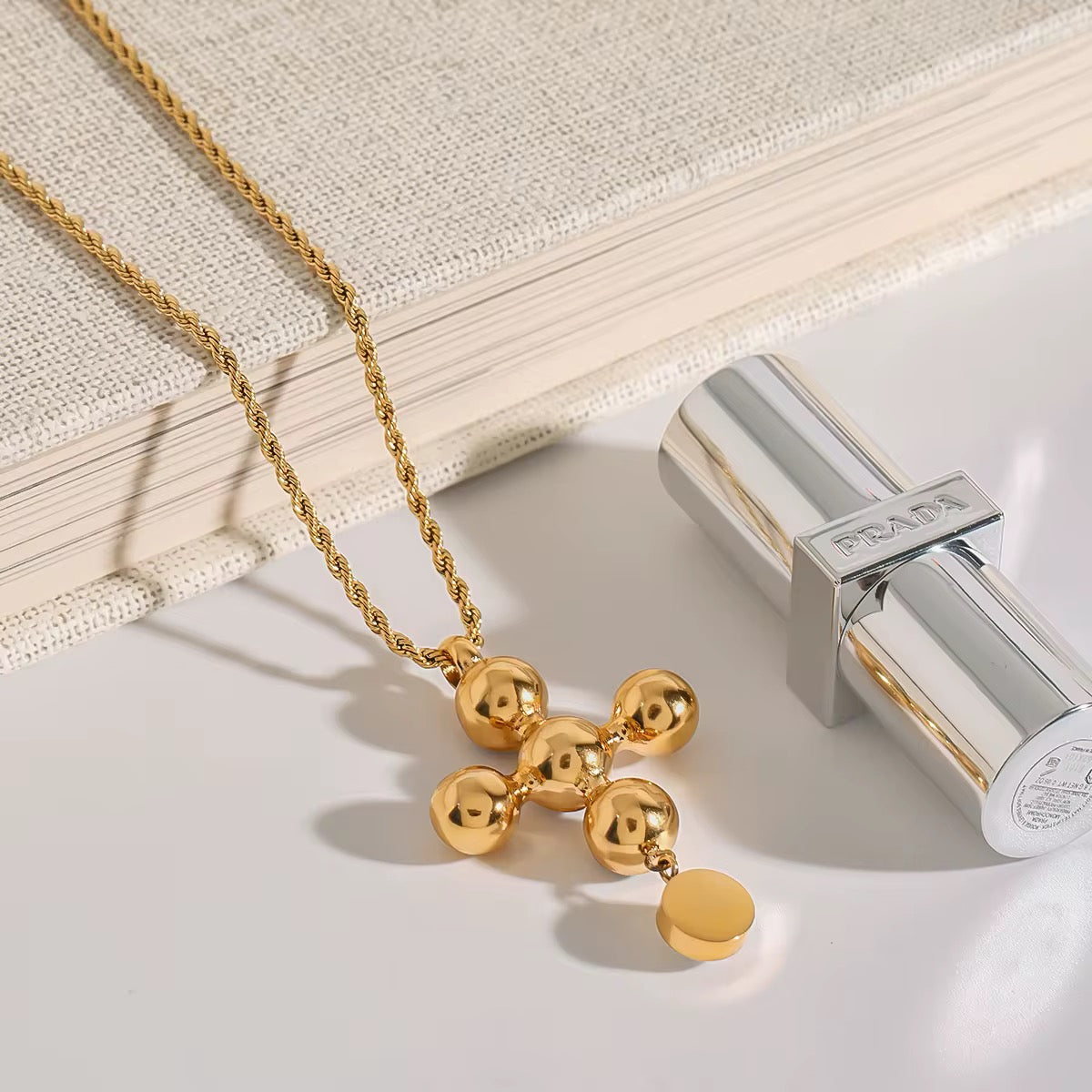 Cadena cruz esferas bitono